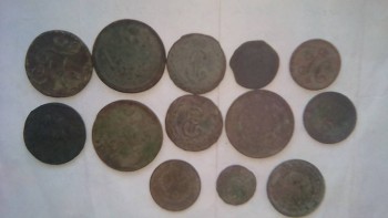 с лева на право копейка 1801 г. 2 копейки 1810 г. копейка сибирская 1769 г. денга сибирская 1769 г. полкопейки серебромъ 1845 г, копейка 1715 г. 2 копейки 1819 г. копейка сибирская 1774 г. 3 копейки 1892 г. 2 копейки 1872 г. 1 копейка год непонятен не отмыта . полушка сибирская 1770 г. 1 копейка 1875 г.